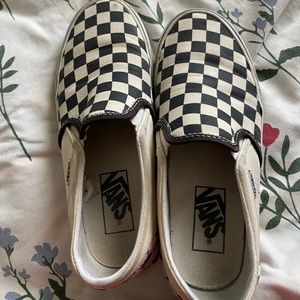 Checkerboard slip on vans